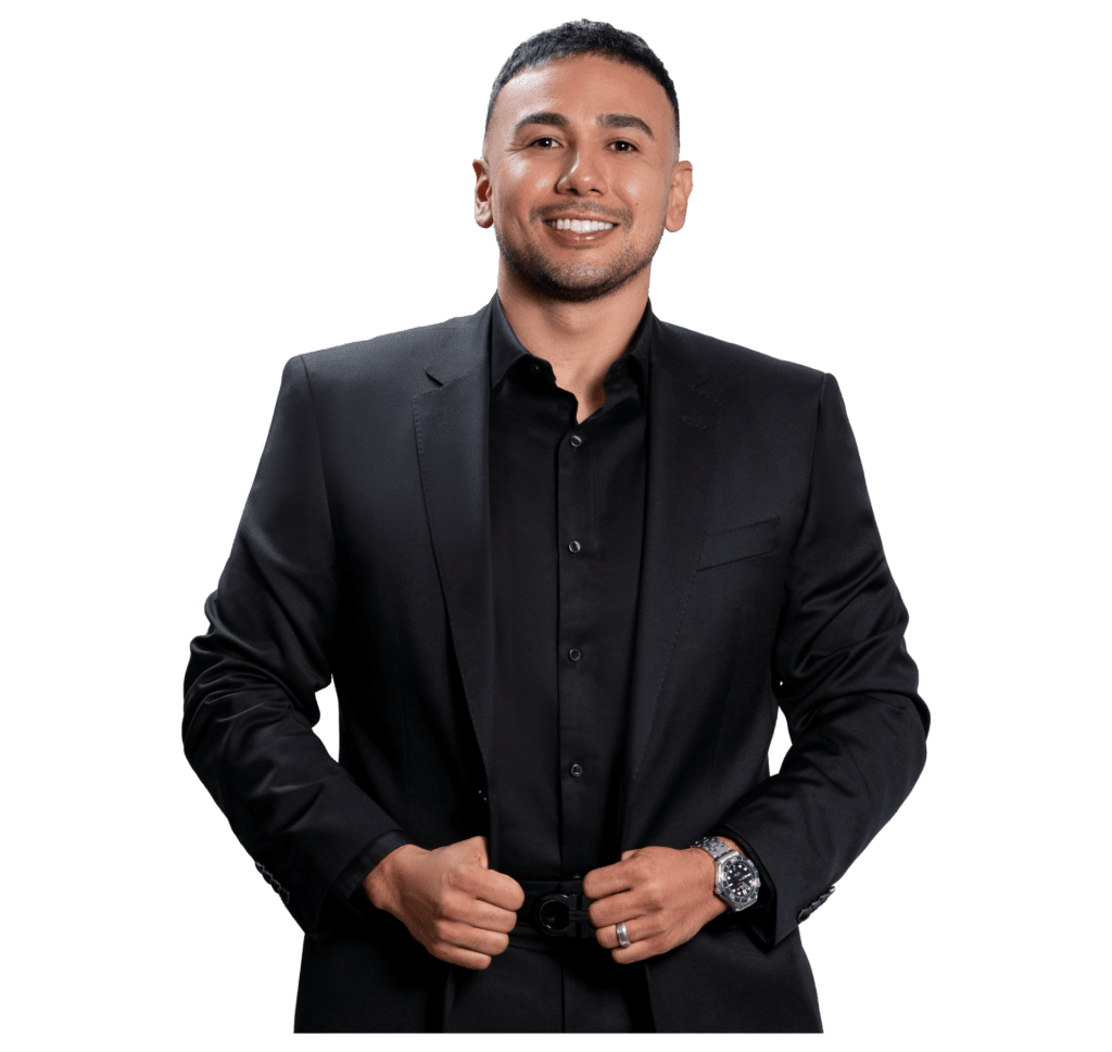 Experienced real estate agent representing Jeremy Navarro Realty Group, showcasing professionalism and dedication in property sales and client service.