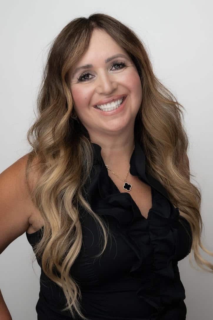 Professional portrait of a real estate expert in Albuquerque, NM, showcasing confidence and expertise in the local property market.